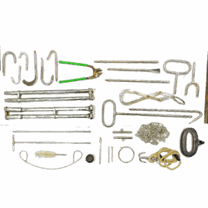 A comprehensive veterinary dystocia set with calving chains, OB hooks, forceps, and various tools for assisting animal births.